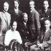3. Зайцев (стоит первым слева), Муратов и Андрей Белый (сидят). Фотография 1923 года